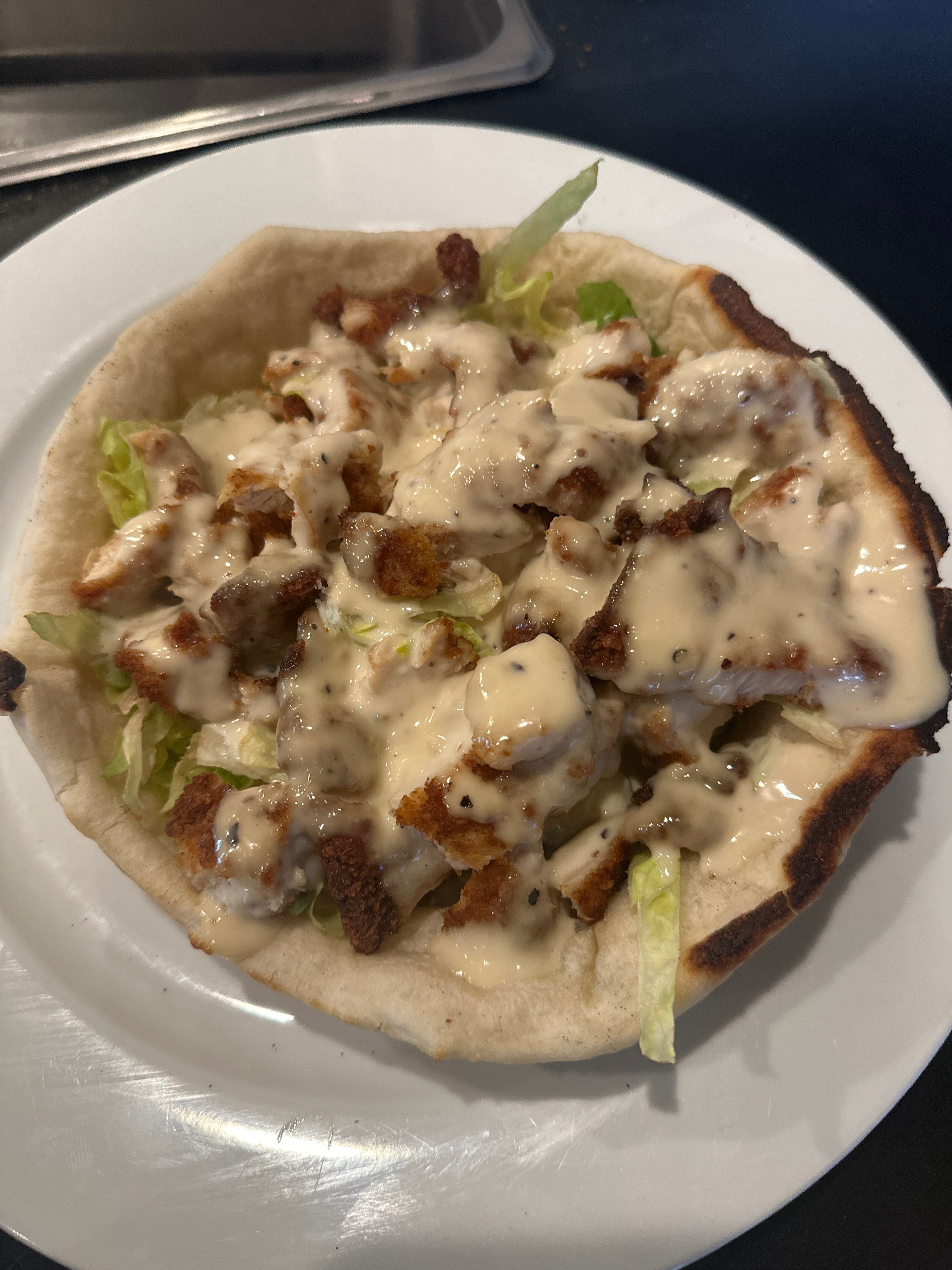 Caesar Bowl Pizza Slice.